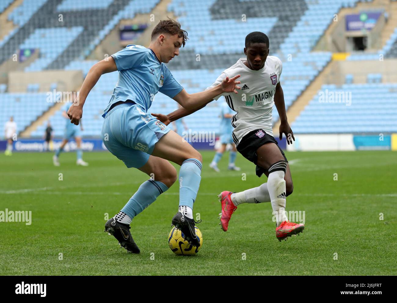 Coventry’s Che Ranger battles for the ball with Ipswich’s Afi Adebayp during the Premier League Development Cup Final at the Coventry Building Society Arena, Coventry. Picture date: Monday May 2, 2022. Stock Photo