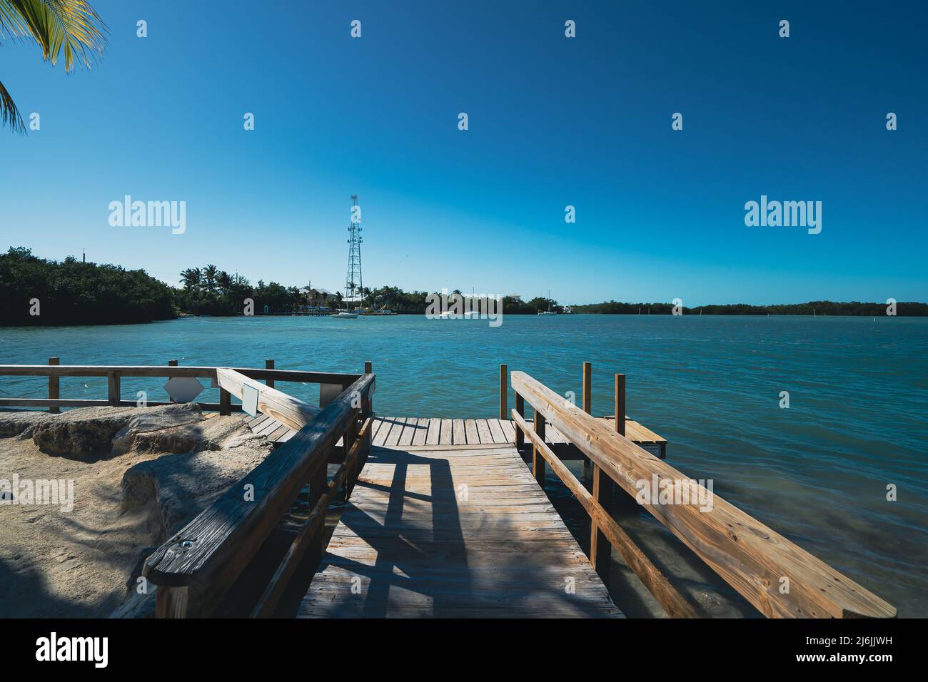 Boat dock on the ocean water in Islamorada, Florida Keys Stock Photo