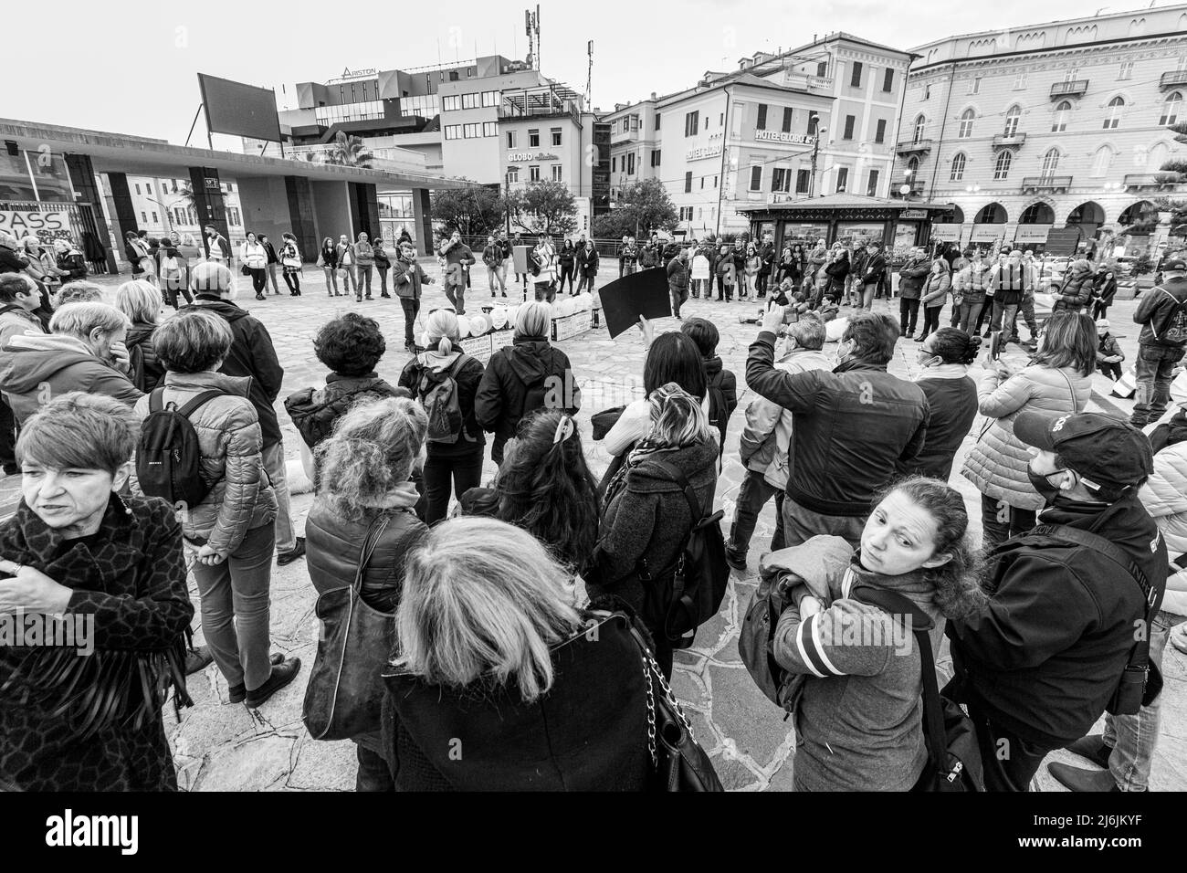 Sanremo, Italy, 20/11/2021: Italian citizens united to demonstrate in the streets against the Green Pass law, journalistic reportage Stock Photo