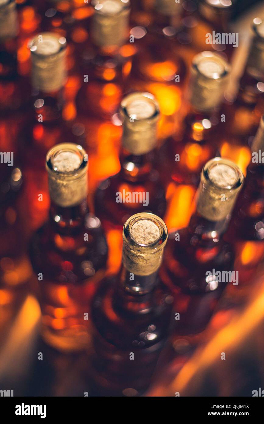 Ice, dessert wine bottles. Franc bottles of wine in rows in