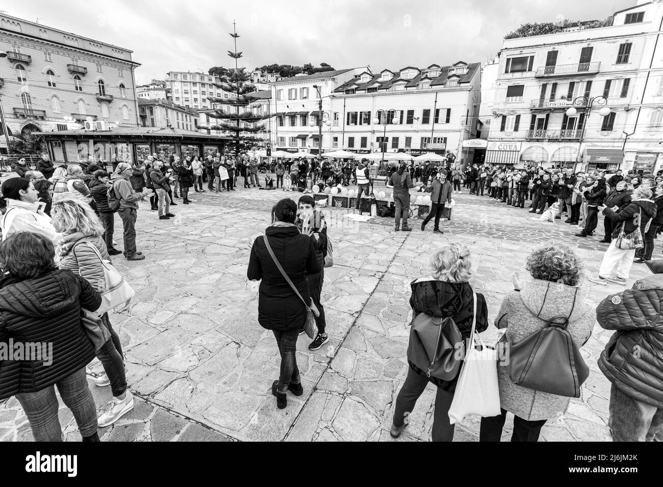Sanremo, Italy, 20/11/2021: Italian citizens united to demonstrate in the streets against the Green Pass law, journalistic reportage Stock Photo