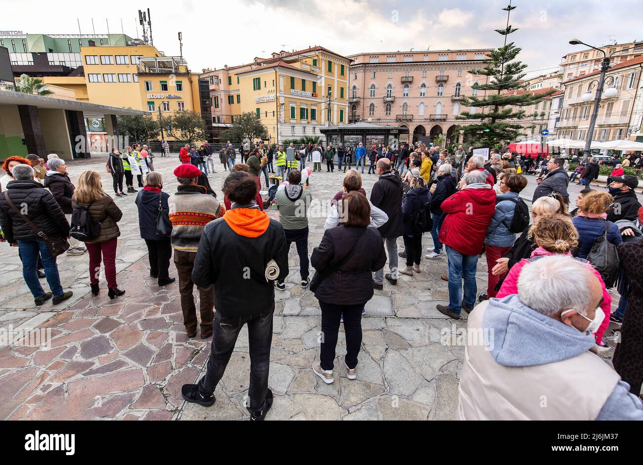 Sanremo, Italy, 20/11/2021: Italian citizens united to demonstrate in the streets against the Green Pass law, journalistic reportage Stock Photo