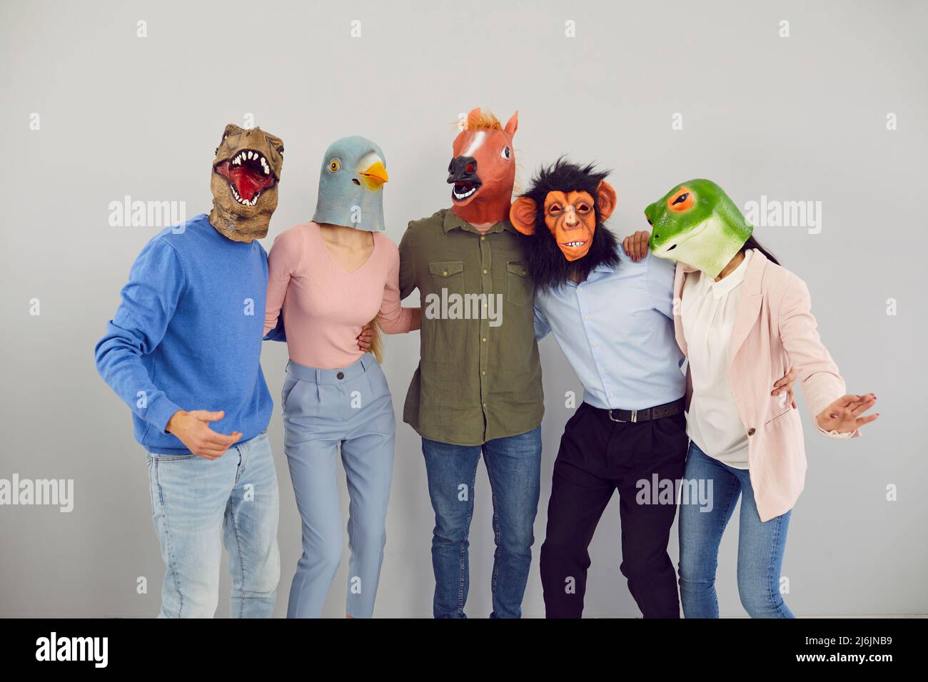 Cool diverse people in animal masks have fun Stock Photo