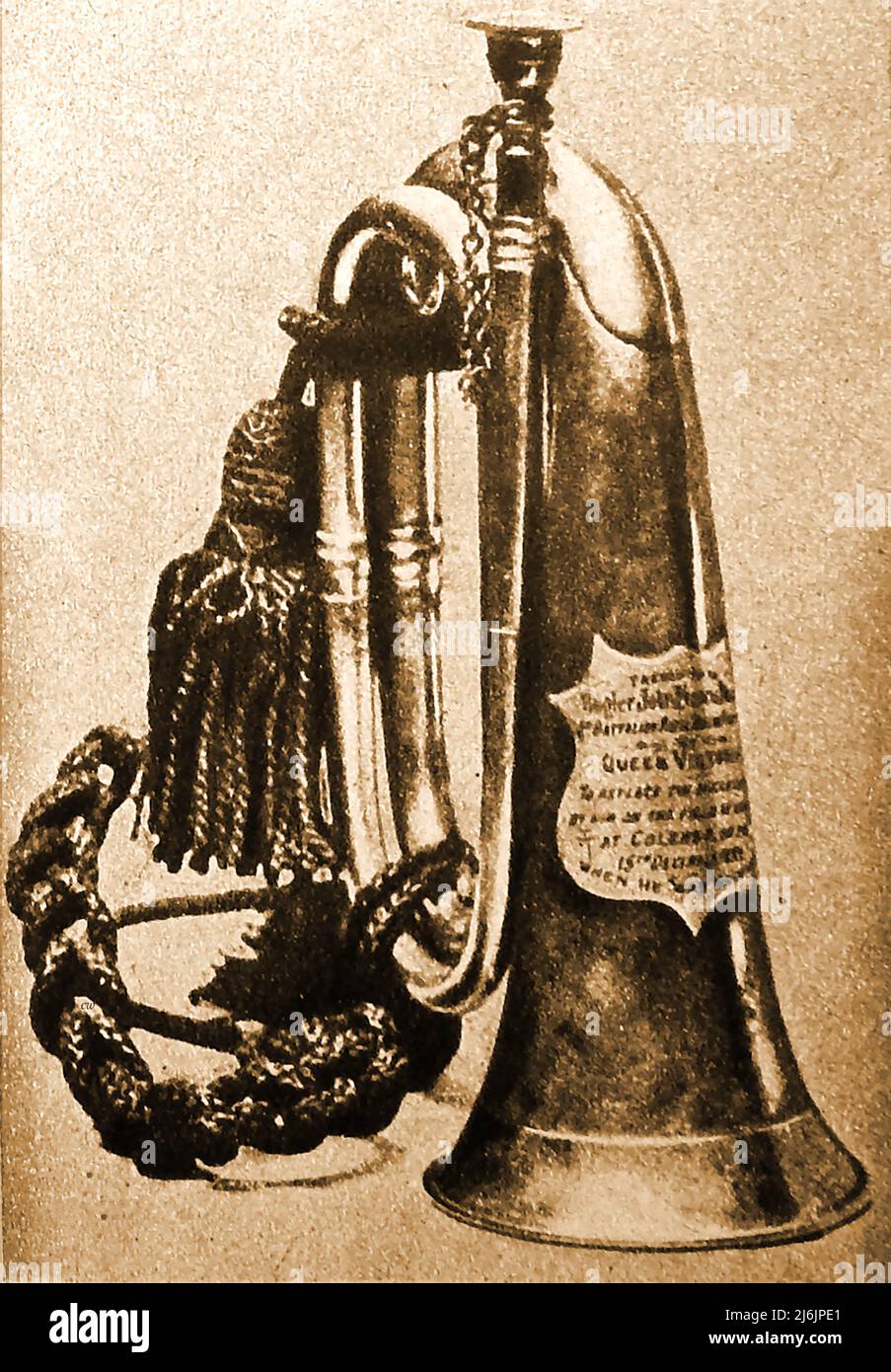 Boer War - A 1900 photograph of  the trumpet presented to the  'Hero of Colenso' , Bugler Dunn (John Francis Dunne) 1898-1950,  of the Royal Dublin Fusiliers, the regiment he joined as a boy bugler when aged 14. Wounded at Colenso, South Africa ( 15th Dec 1899), he  he lost his bugle but so impressed the British public that he was declared a hero .Queen Victoria  personally presented him with this  silver inscribed replacement  bugle at Osborne House. Stock Photo