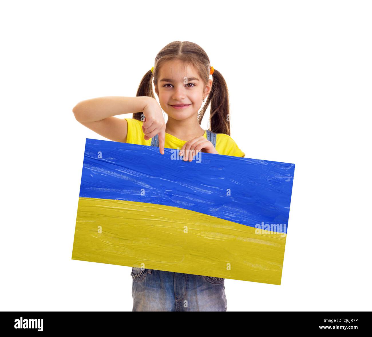 Girl holding Ukrainian blue and yellow flag Stock Photo