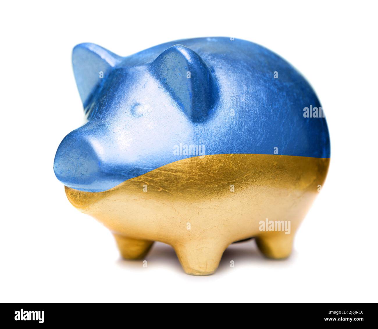Golden pig moneybox in the color of Ukrainian flag Stock Photo