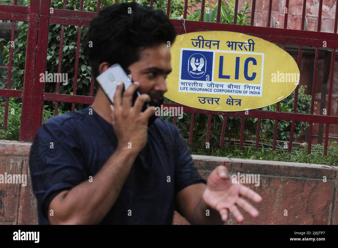 May 2, 2022, New Delhi, New Delhi, India: A man speaks on his phone outside the Life Insurance Corporation of India (LIC) office. (Credit Image: ©  Karma Sonam Bhutia/ZUMA Press Wire) Stock Photo