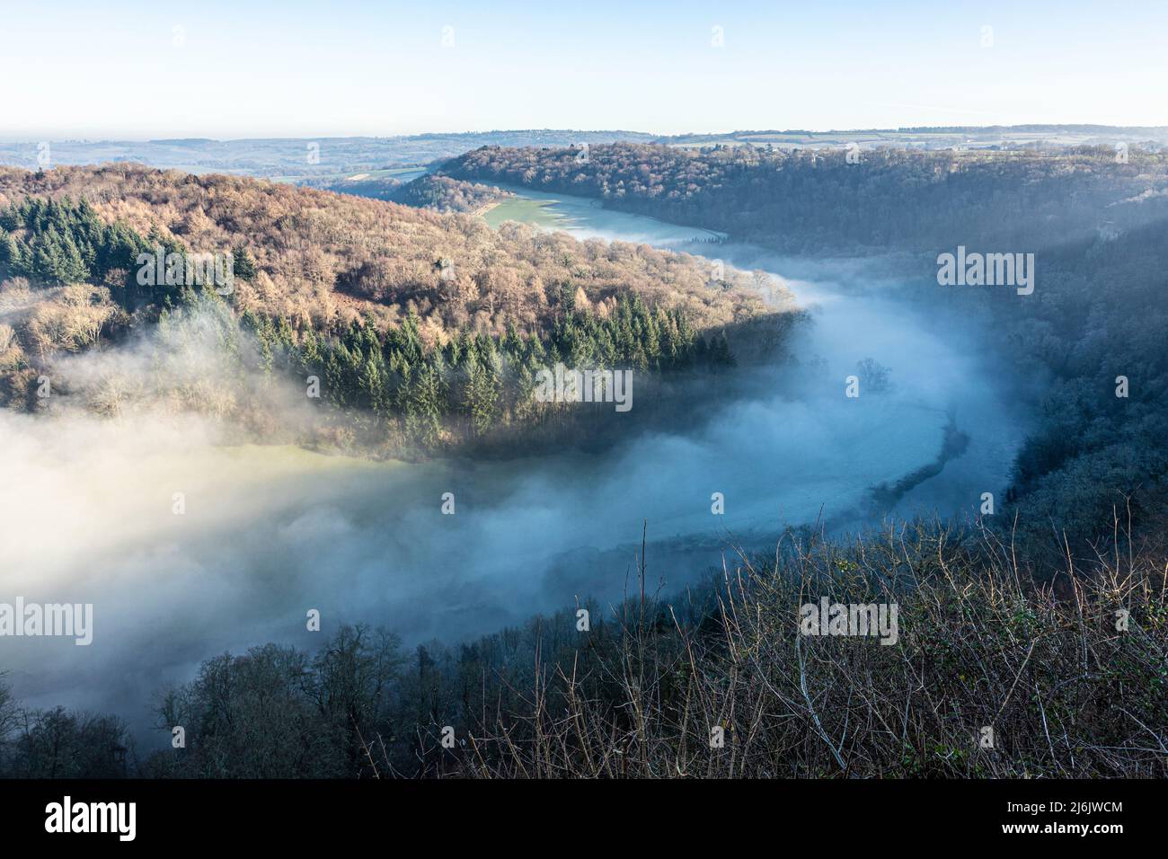 The River Wye obscured by mist due to a temperature inversion, seen from the viewpoint of Symonds Yat Rock, Herefordshire, England UK Stock Photo