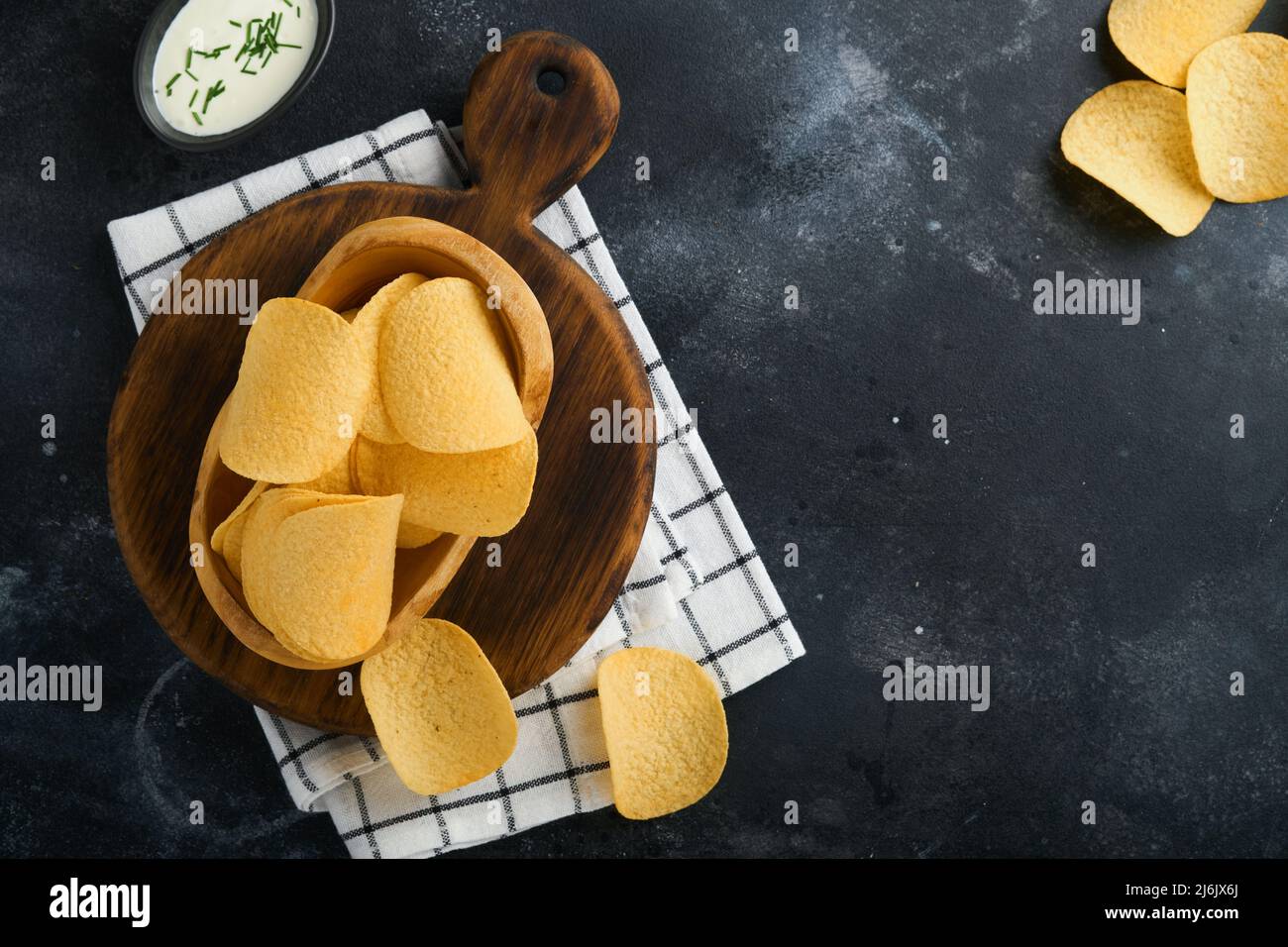 Unhealthy food. Snacks. All classic potato snacks with peanuts, popcorn