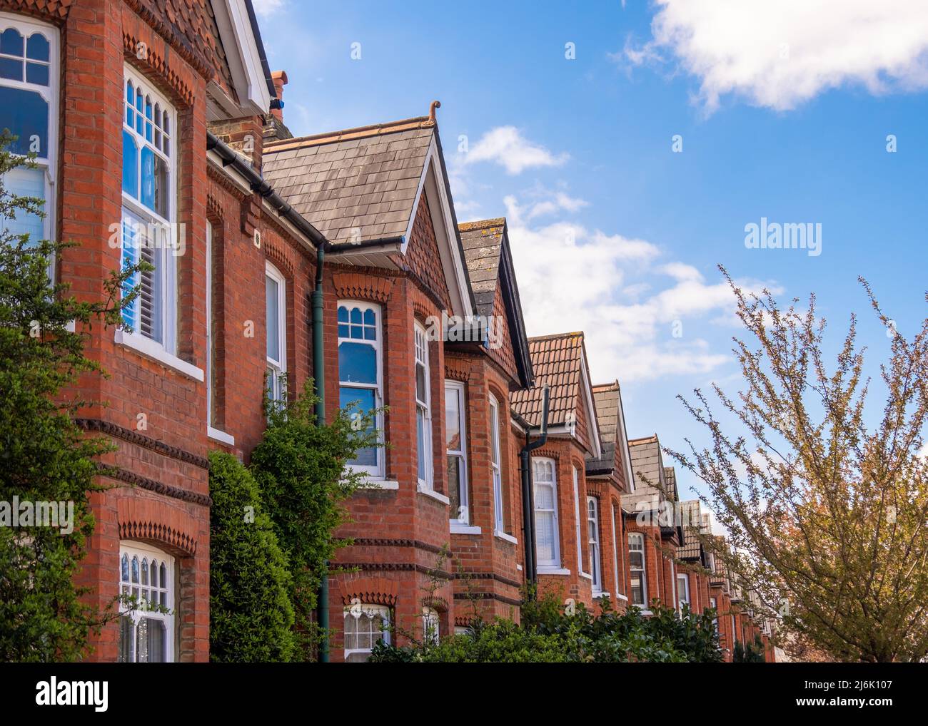 Typical British red brick terraced houses in West London Stock Photo