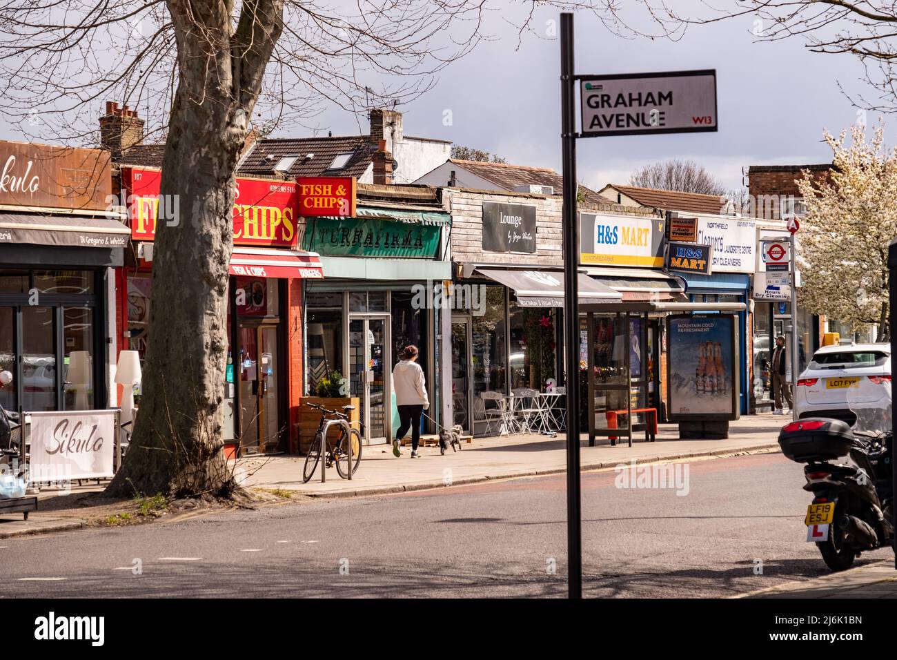 London April 2022 High street of small shops on Northfields in Ealing