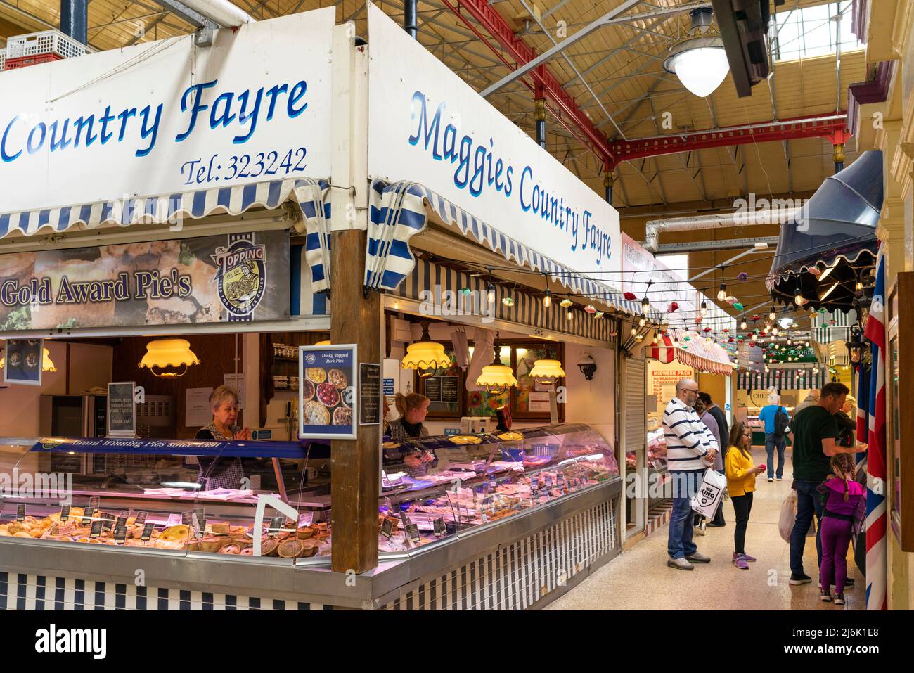 Doncaster indoor market stalls -with people shopping Doncaster market Doncaster South Yorkshire England UK GB Europe Stock Photo