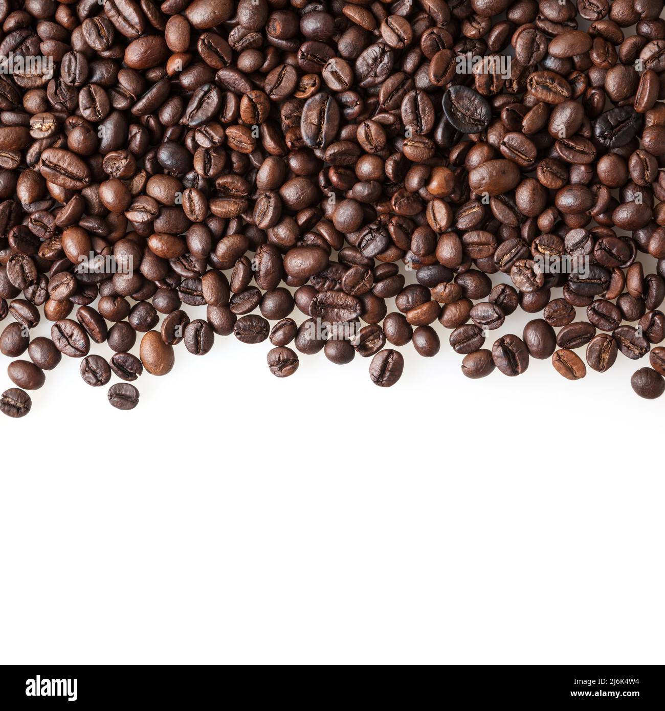 Roasted coffee beans on white background with copy space Stock Photo ...