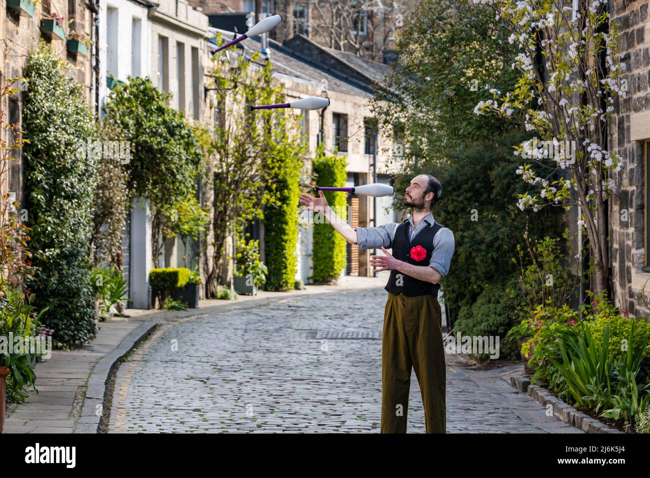 Circus act juggler, Robert GallagherLyall practising juggling clubs