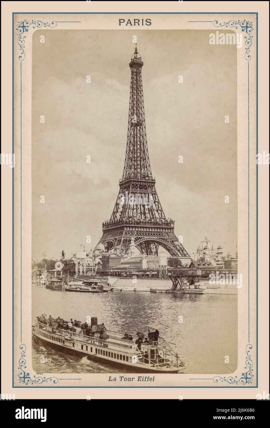 PARIS Vintage Post Card 1900s B&W Retro Eiffel Tower and River Seine with city tour boat in foreground Paris France. Postcard View of the Eiffel Tower La Tour Eiffel Paris  Photographer Étienne Neurdein Stock Photo