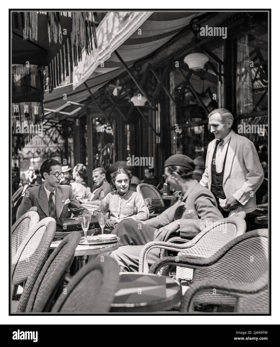PARIS CAFE RETRO 1940s Post WW2 War freedom optimism with students