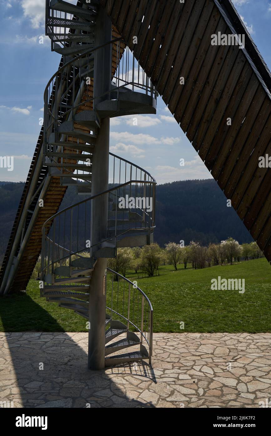 Salas, Czech Republic - April 17, 2022 - A completely unconventional tourist lookout tower above the village of Salas in the foothills of the Chriby M Stock Photo