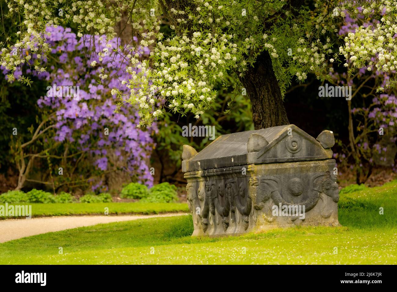 Marble sarcophagus in the garden at Chatsworth House, Derbyshire, UK Stock Photo