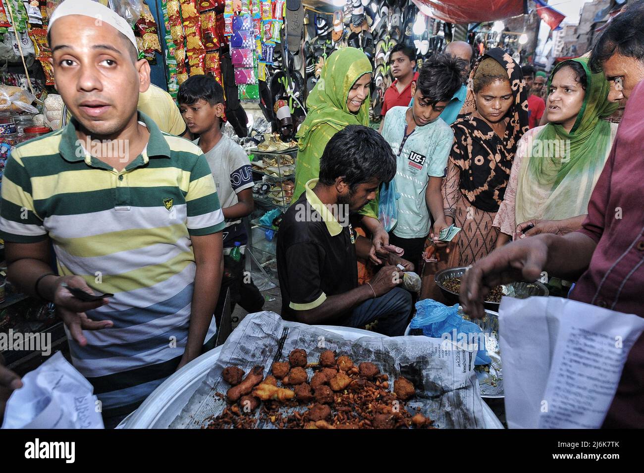 Dhaka, Bangladesh. 2nd May 2022. People at the Bihari Camp cooking food and making preparations for Eid al-Fitr. Also known as the Geneva camp, it has about 50 thousand Urdu speaking Indian & Pakistani people living at the camp. The Bihari minority remain some of Bangladesh’s most marginalized communities. Credit: Majority World CIC/Alamy Live News Stock Photo
