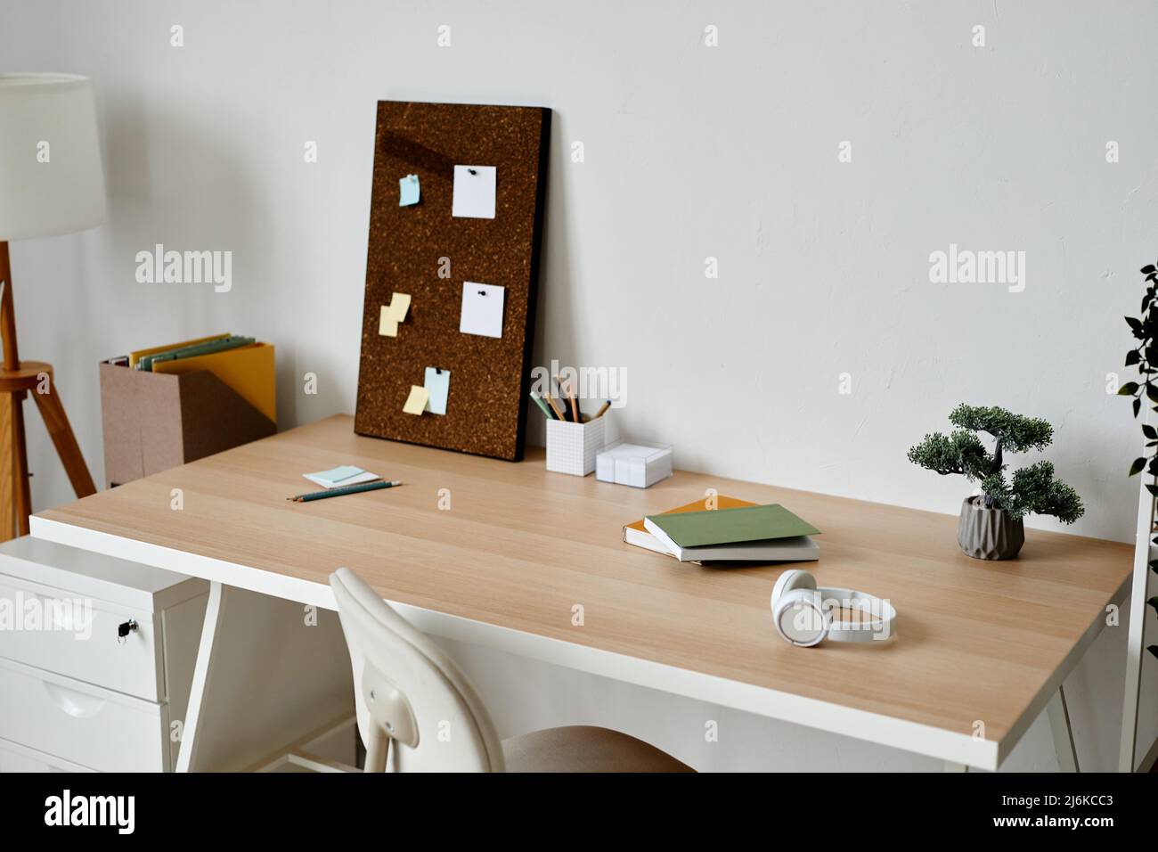 Background of white home office workplace with bonsai tree on desk, copy  space Stock Photo - Alamy