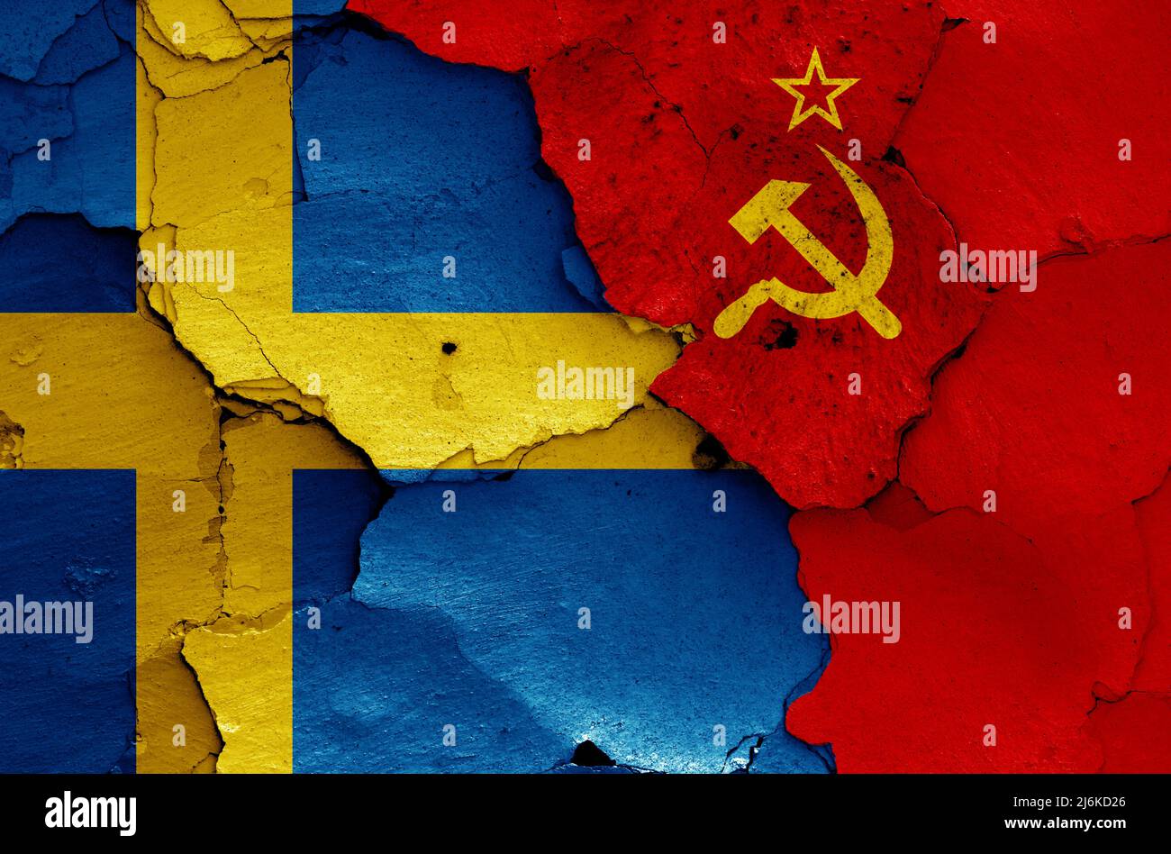 flags of Sweden and Soviet Union painted on cracked wall Stock Photo