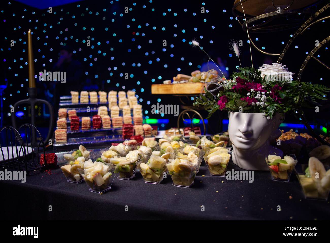 fruit slicing in plastic cups on the catering. Stock Photo