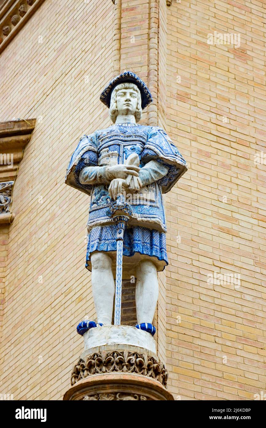 statue of soldier with ceramic decoration on the Pabellón Real in Seville Sevilla Spain now government offices Stock Photo