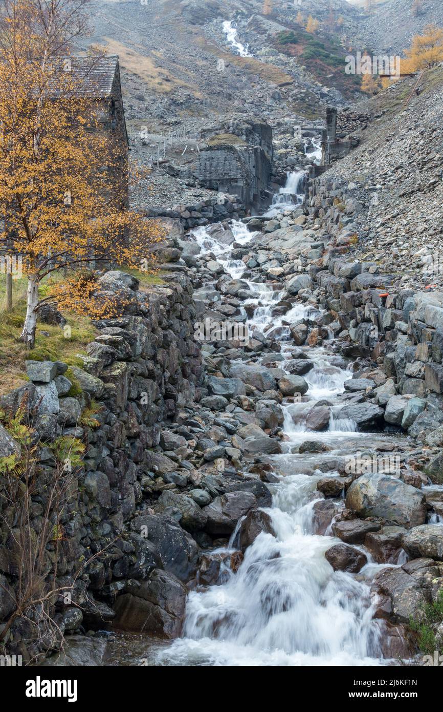 Old disused Greenside Mine workings and beck, Glenridding, Cumbria, UK Stock Photo