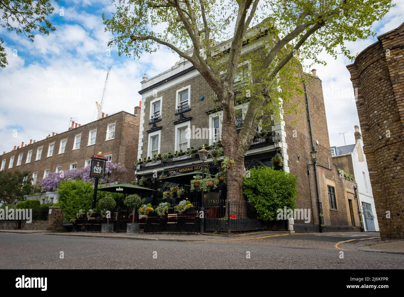 London, April 2022: The Scarsdale Tavern, an old traditional pub off High Street Kensington Stock Photo