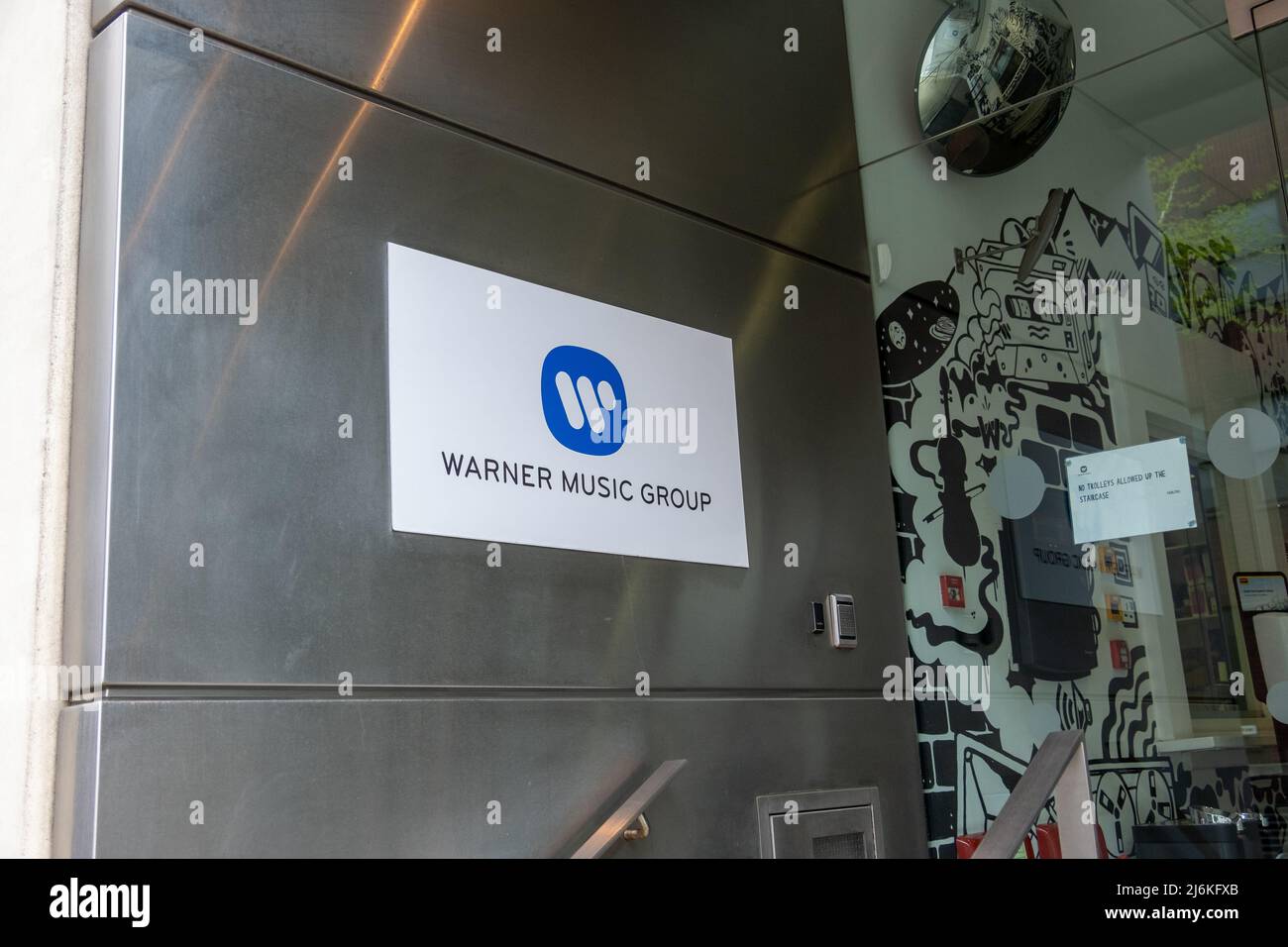 London, April 2022: Headquarters of Warner Music Group in Kensington, London. Stock Photo
