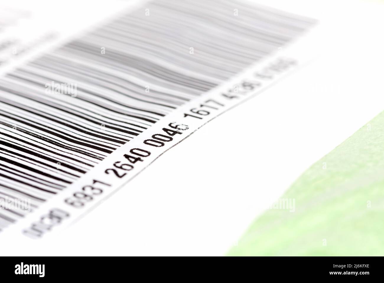 Part of a long barcode label sticker up close, number on a post package parcel, object detail, extreme closeup, shallow depth of field nobody, shippin Stock Photo