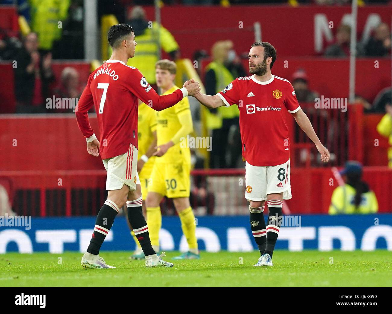 Manchester United's Cristiano Ronaldo greets Juan Mata as he leaves the  field of play during the Premier League match at Old Trafford, Manchester.  Picture date: Monday May 2, 2022 Stock Photo - Alamy