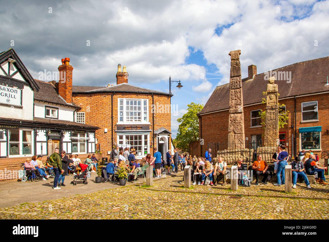 People enjoying the spring sunshine around the ancient Saxon crosses in ...