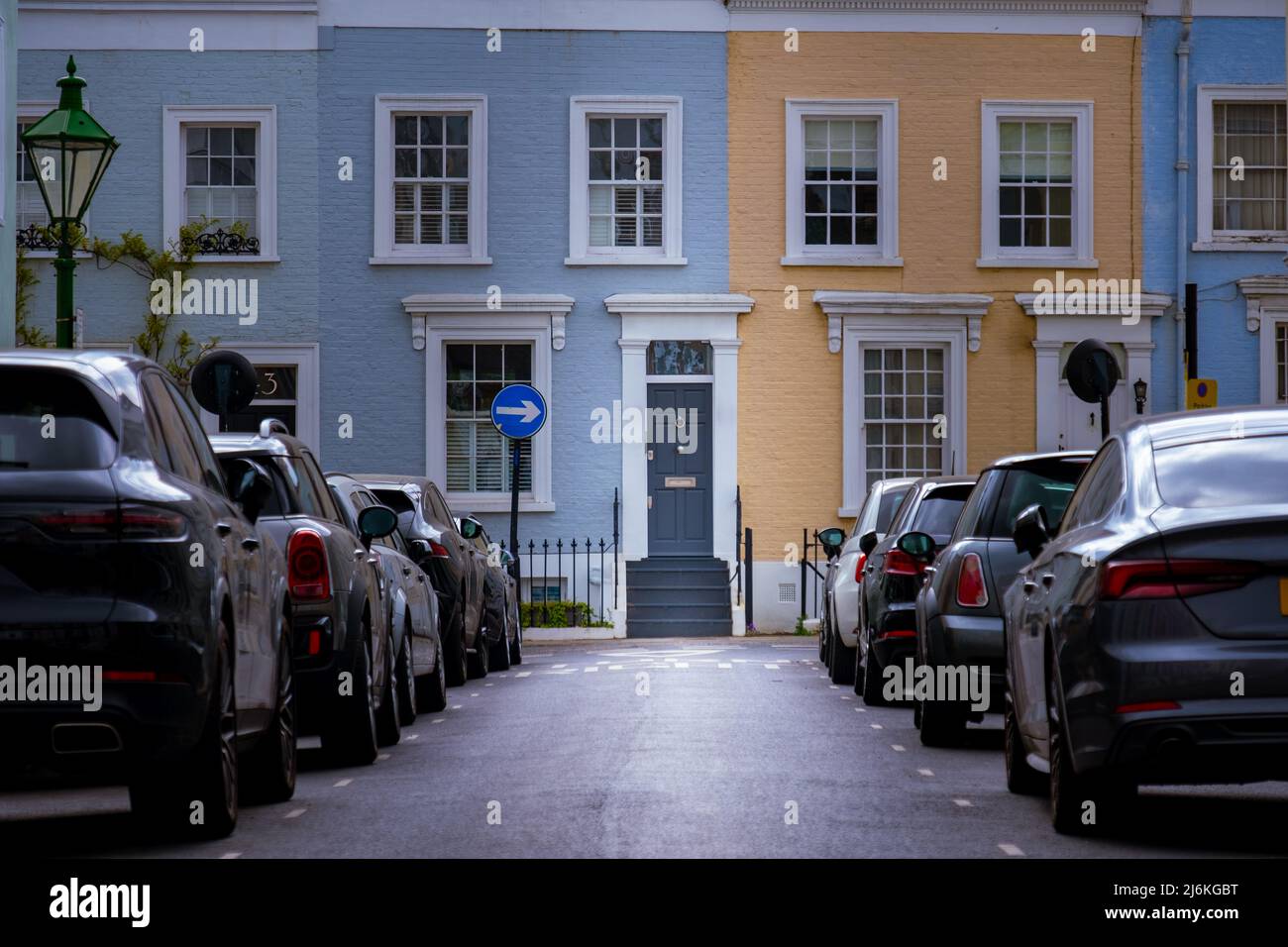 London -April 2022: Colourful street of upmarket townhouses in Notting Hill area of West London Stock Photo