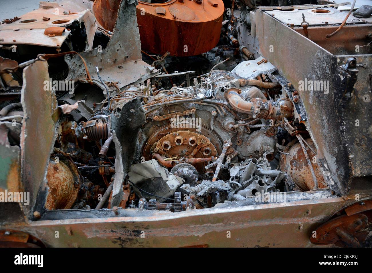 Kyiv region, Ukraine - 02 May 2022, Close-up of the engine of a destroyed Russian tank seen on the roadside, it was destroyed by the Ukrainian military in the Kiev region. Russia invaded Ukraine on 24 February 2022, triggering the largest military attack in Europe since World War II. Stock Photo