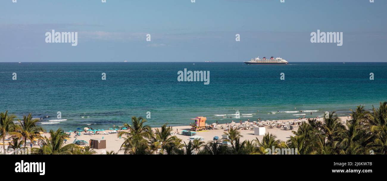 Cruise ship sails past beach in Miami, Florida, USA Stock Photo