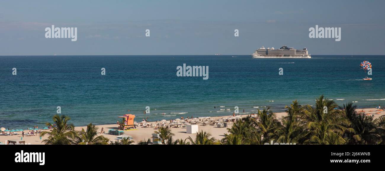Cruise ship sails past beach in Miami, Florida, USA Stock Photo