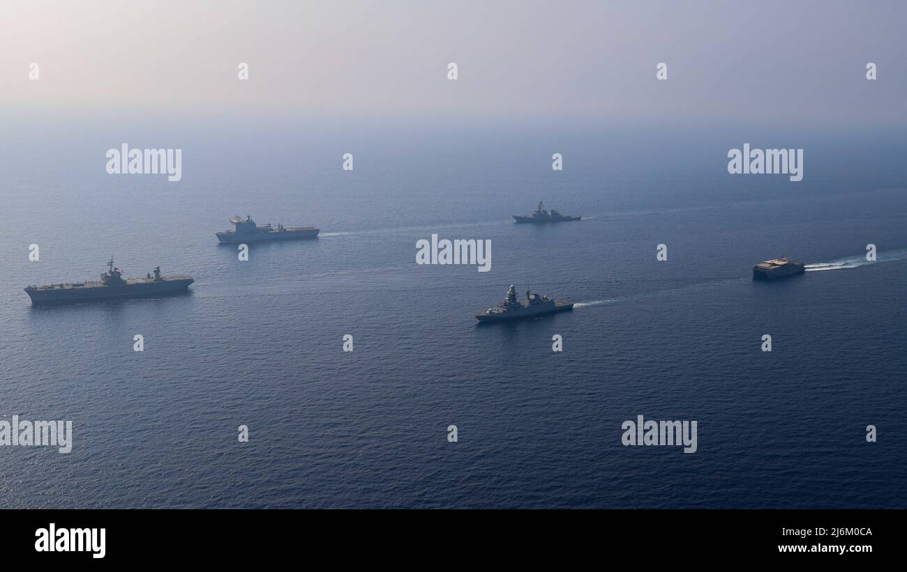 220501-N-TT059-1058 GULF OF ADEN (May 1, 2022) Amphibious command ship USS Mount Whitney (LCC 20), Italian Navy frigate Carlo Bergamini (F 590), guided-missile destroyer USS Gonzalez (DDG 66), expeditionary fast transport ship USNS Choctaw County (T-EPF 2) and British Royal Fleet Auxiliary RFA Lyme Bay (L 3007) sail in formation in the Gulf of Aden, May 1. Carlo Bergamini, the flagship for the European Union Naval Force's Combined Task Force (CTF) 465, operated in cooperation with the other vessels of CTF 153, a Combined Maritime Forces task force focused on maritime security and capacity buil Stock Photo
