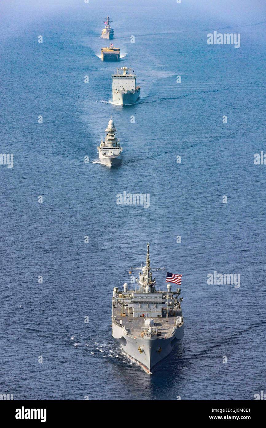 220501-N-TT059-1007 GULF OF ADEN (May 1, 2022) Amphibious command ship USS Mount Whitney (LCC 20), Italian Navy frigate Carlo Bergamini (F 590), guided-missile destroyer USS Gonzalez (DDG 66), expeditionary fast transport ship USNS Choctaw County (T-EPF 2) and British Royal Fleet Auxiliary RFA Lyme Bay (L 3007) sail in formation in the Gulf of Aden, May 1. Carlo Bergamini, the flagship for the European Union Naval Force's Combined Task Force (CTF) 465, operated in cooperation with the other vessels of CTF 153, a Combined Maritime Forces task force focused on maritime security and capacity buil Stock Photo