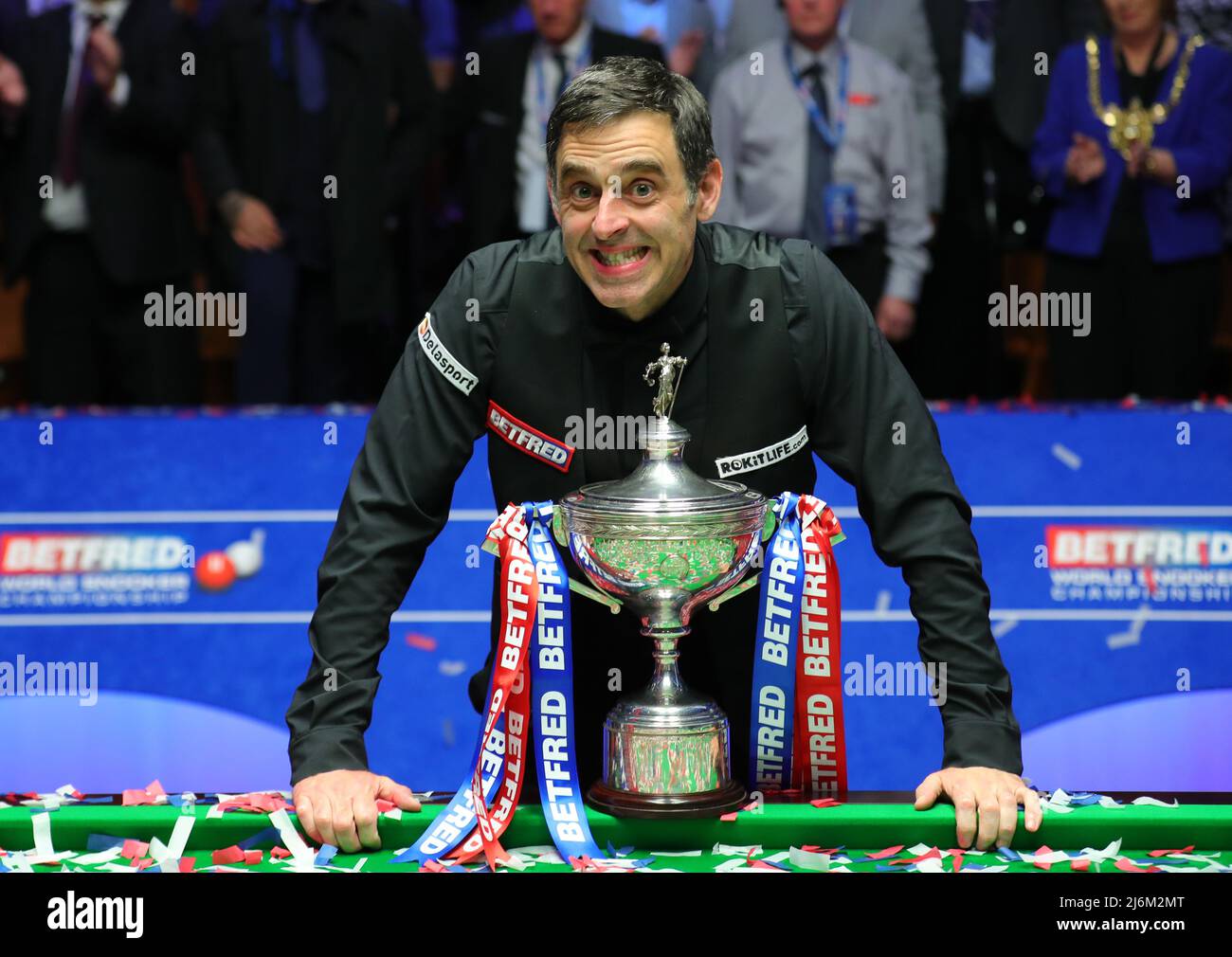 SHEFFIELD, May 3, 2022 (Xinhua) -- Englands Ronnie OSullivan celebrates with the trophy during the awarding ceremony after the final over Englands Judd Trump at the Betfred World Snooker Championship in Sheffield,