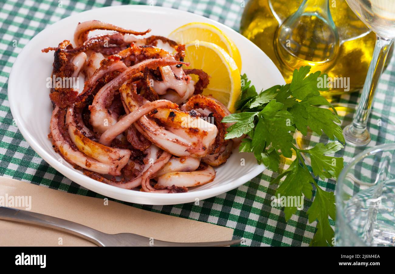 Deep fried squid tentacles Stock Photo - Alamy