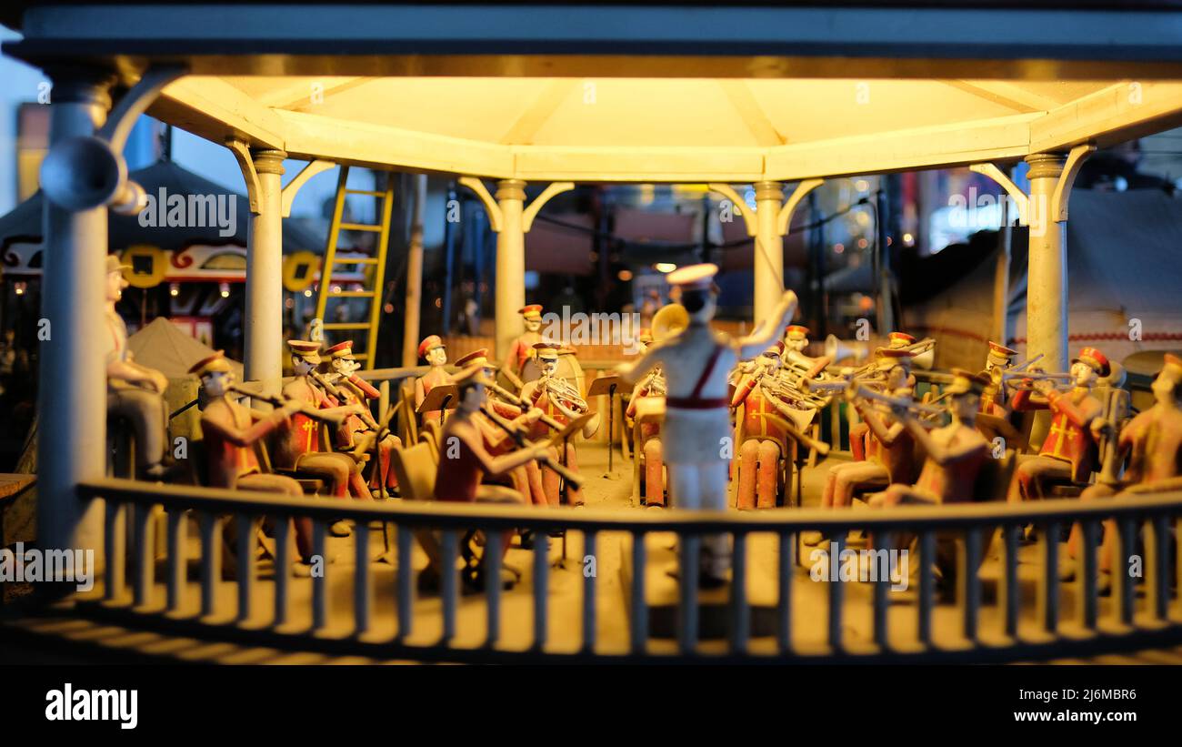 Detail of The Carnival music box penny arcade game at Musee Mecanique in San Francisco, California, USA; municipal band under a kiosk. Stock Photo