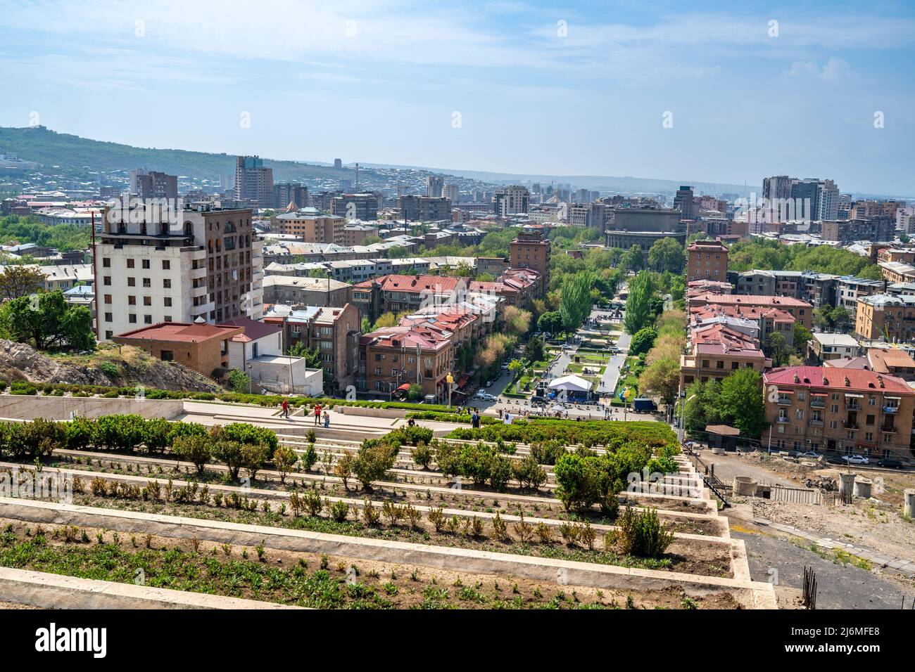 Yerevan, Armenia - April 30, 2022 - Yerevan city aerial view seen from the top of Casecade Complex in Yerevan, Armenia on a bright sunny day Stock Photo