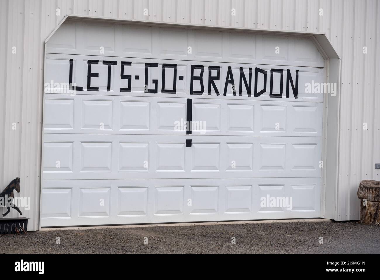 Lets Go Brandon sign on a garage in Joseph, Oregon. Stock Photo