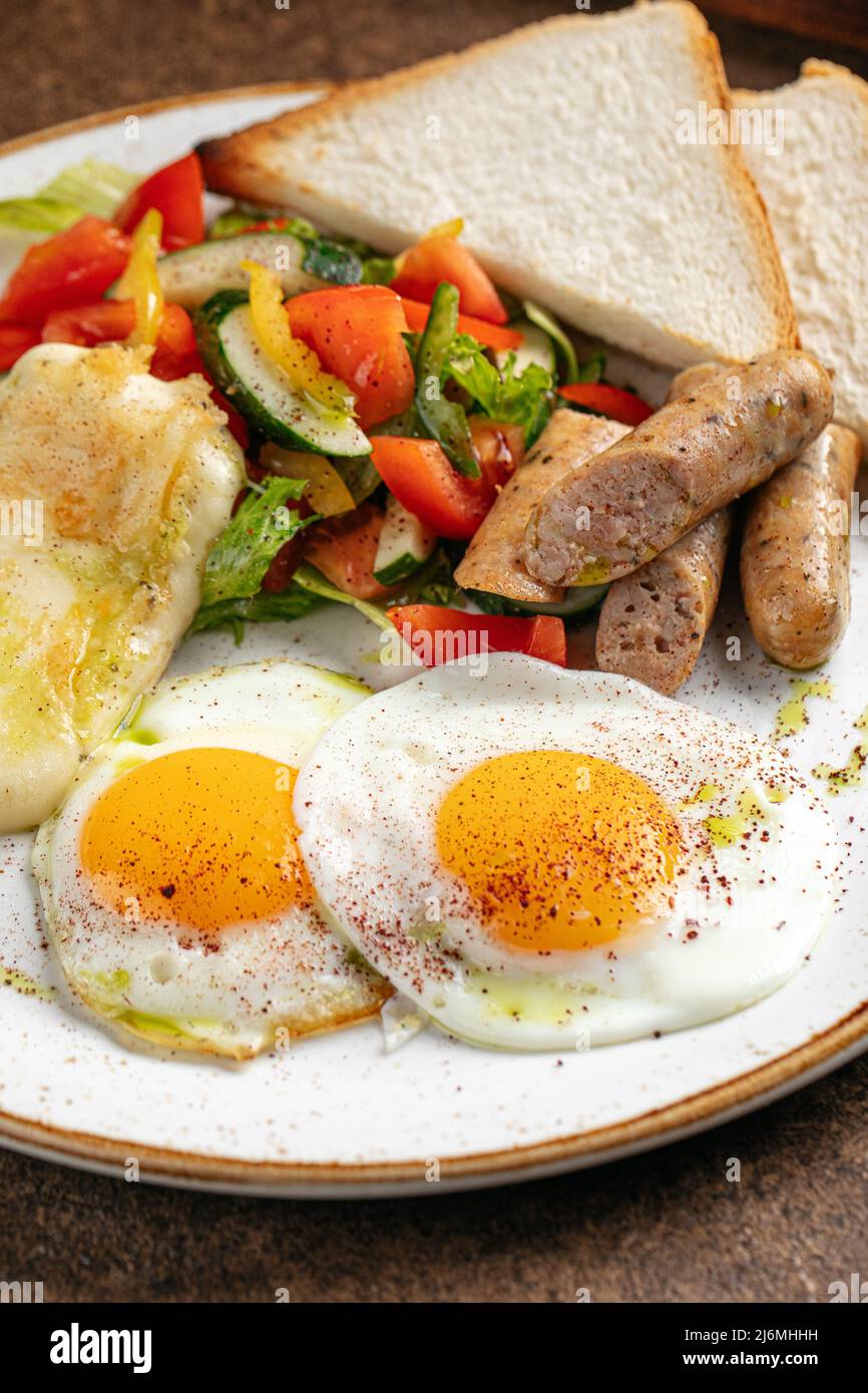 German breakfast with fried eggs and sausages Stock Photo Alamy