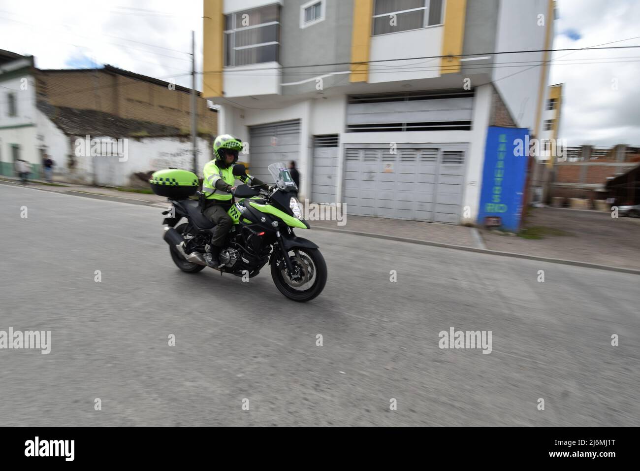 Pasto, Colombia. 02nd May, 2022. Colombia's Police opens the road track during the 2022 Vuelta de la Juventud cycling race in Pasto, Colombia on May 2, 2022. Photo by: Camilo Erasso/Long Visual Press Credit: Long Visual Press/Alamy Live News Stock Photo