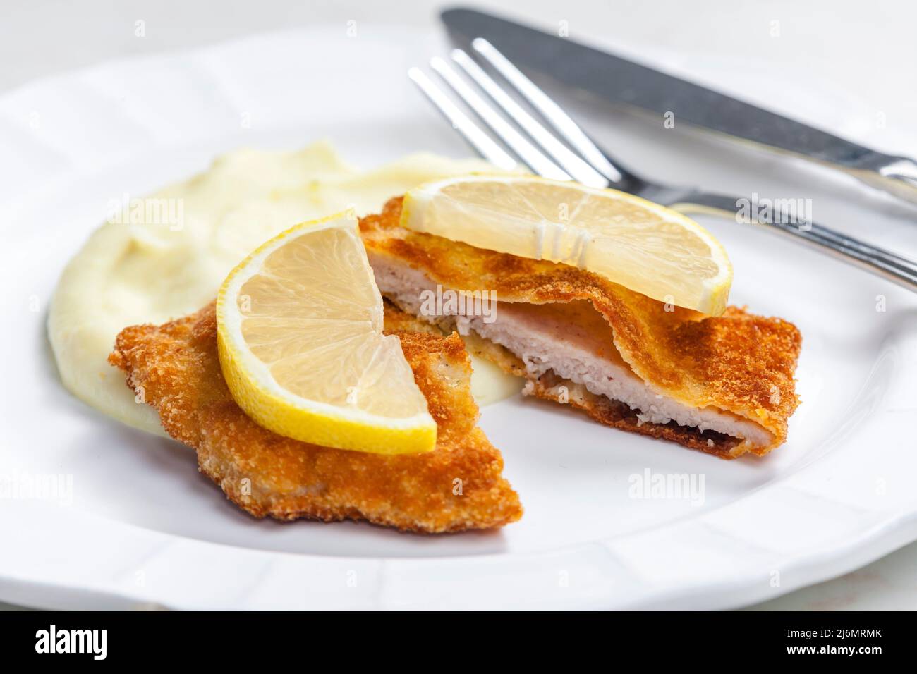 veal schnitzel with mashed potatoes Stock Photo Alamy