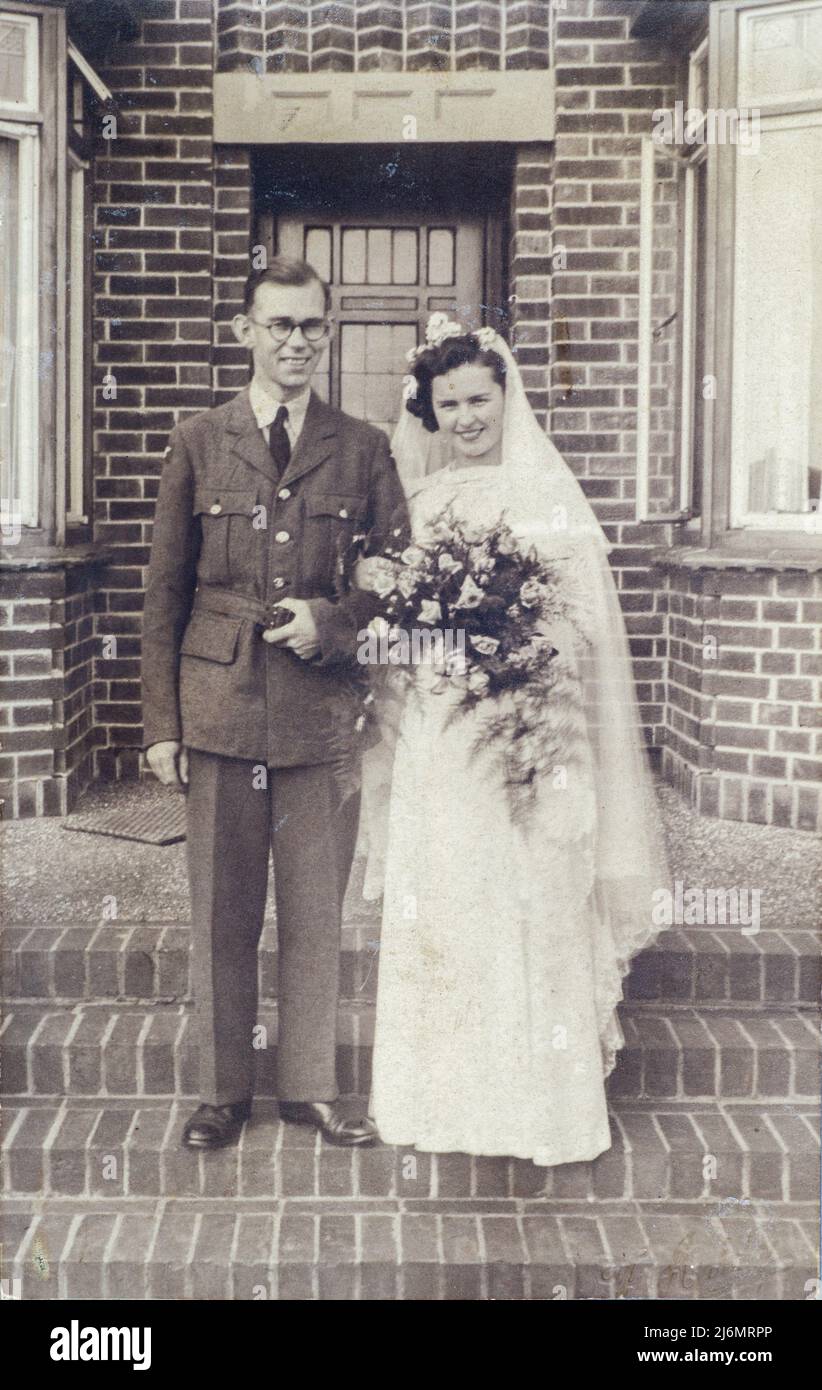 Archival sepia photograph of a newly married couple in wartime with the groom in Royal Air Force uniform, England, 1941, Boston, Lincolnshire, England Stock Photo