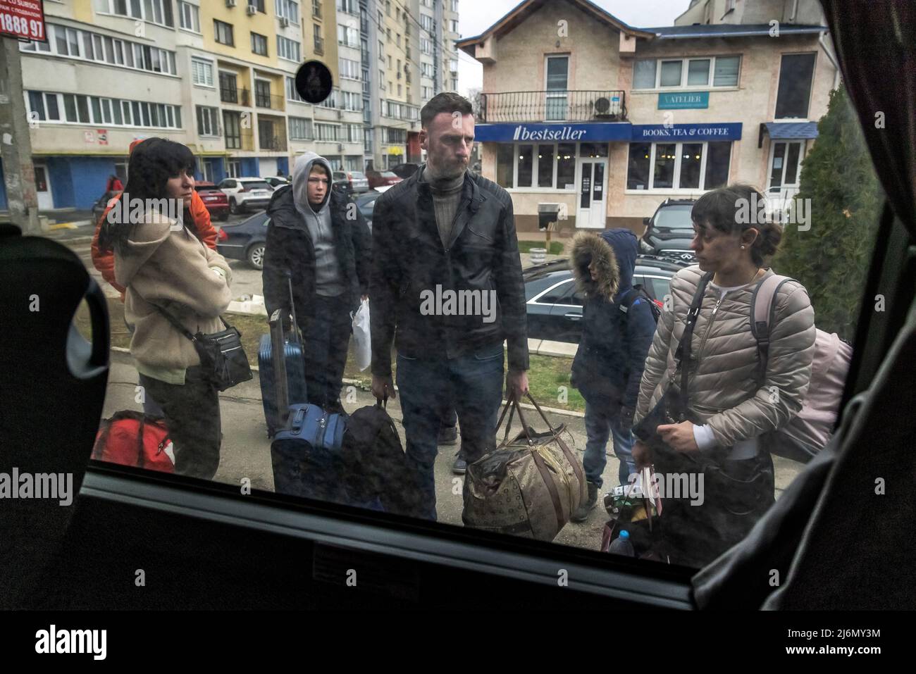 Refugees from Ukraine leave the Moldovan capital Chisinau. From here, the NGO 'Be an Angle' from Berlin organises the onward journey of the refugees by bus to Germany. Stock Photo