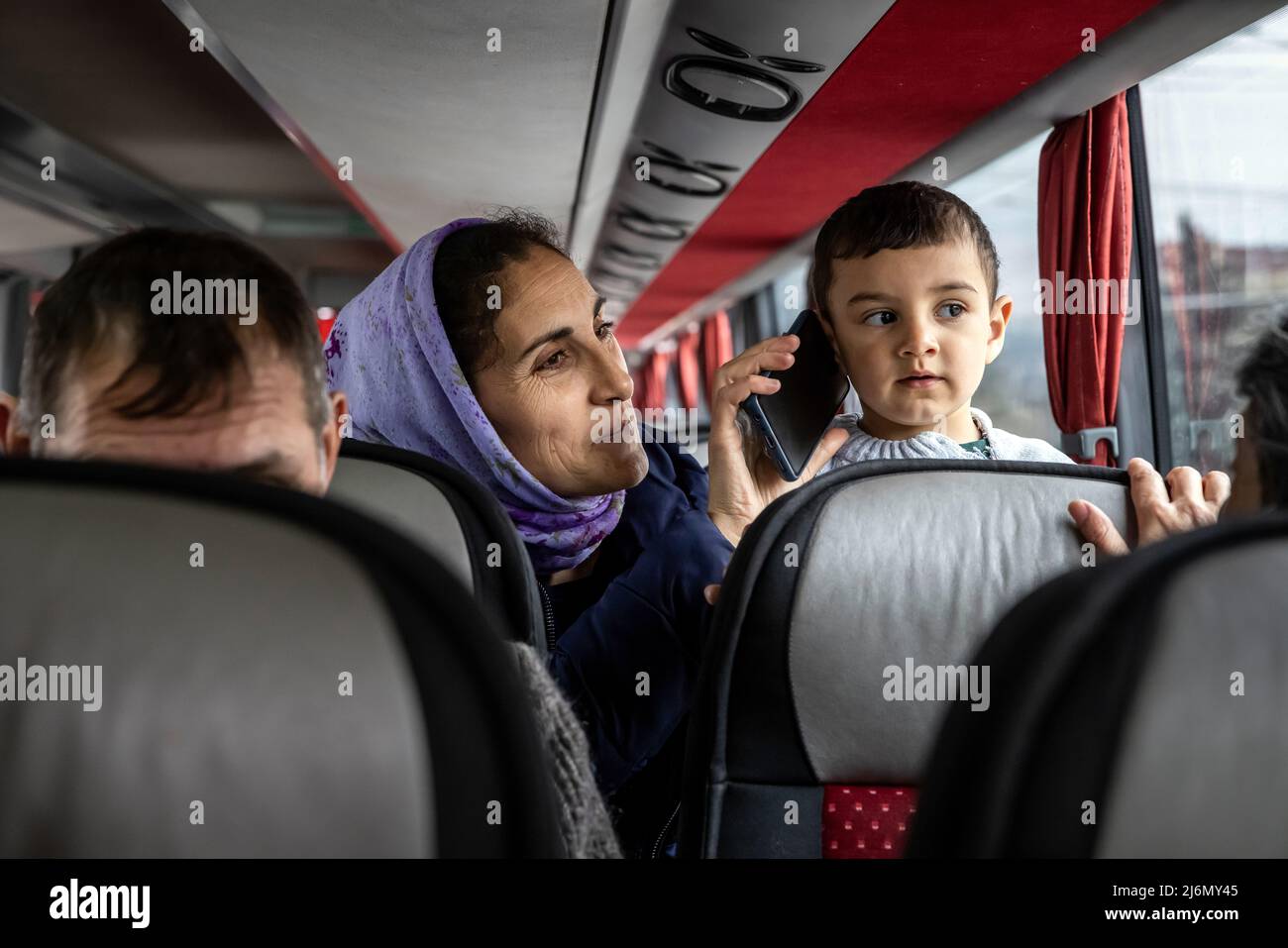 Refugees from Ukraine leave the Moldovan capital Chisinau. From here, the NGO 'Be an Angle' from Berlin organises the onward journey of the refugees by bus to Germany. Stock Photo